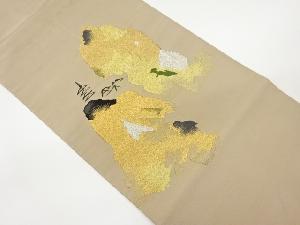 綴れ寺院に抽象模様織出し袋帯